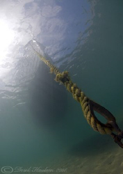 Boat at anchor. Trefor pier. D200, 10.5mm. by Derek Haslam 